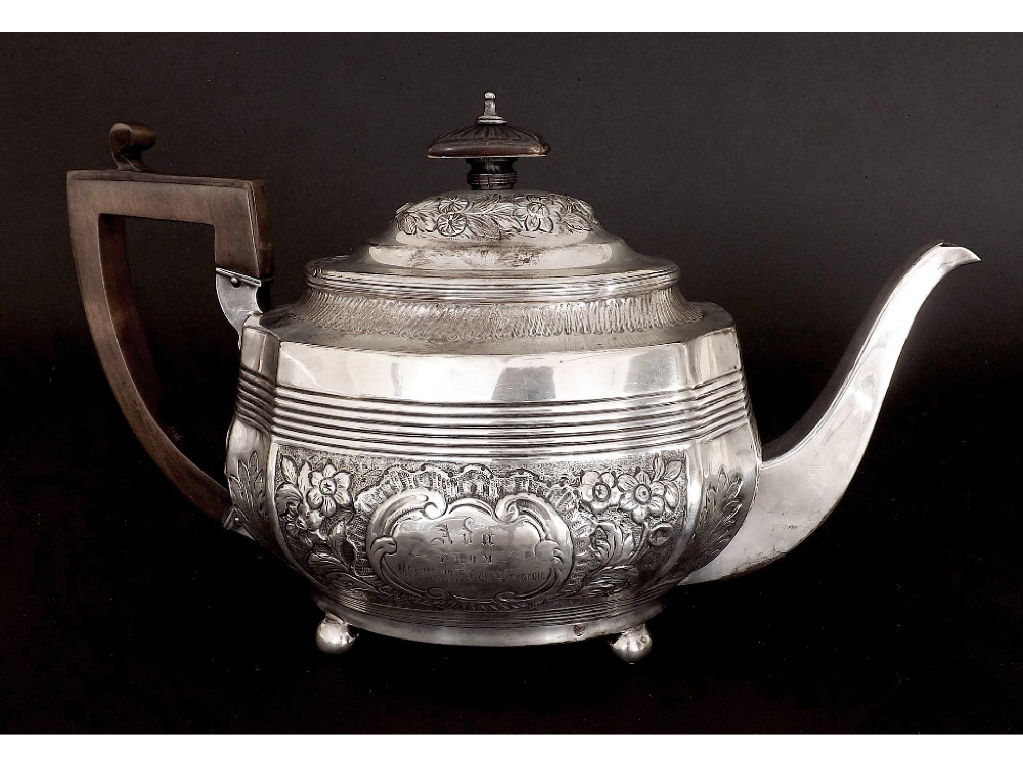 Appraisal: George III silver serpentine teapot with later Victorian chasing of