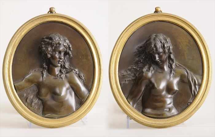 Appraisal: AFTER CLODION PAIR OF BRONZE RELIEF PLAQUES Each oval modeled