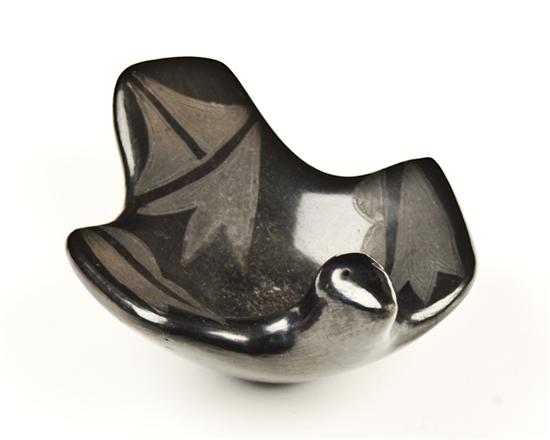 Appraisal: A San Ildefonso Black on Black Pottery Bird Dish mark