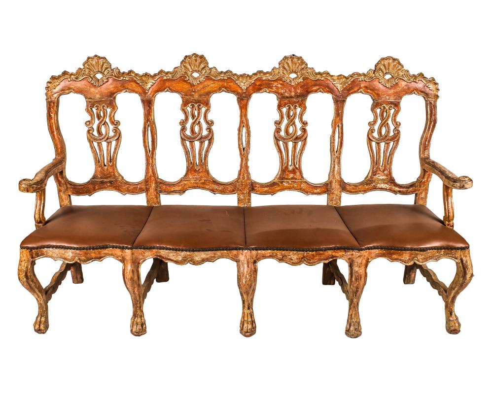 Appraisal: VENETIAN ROCOCO-STYLE PAINTED GILT WOOD SETTEEwith brown leather upholstery inches