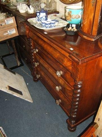 Appraisal: A Victorian mahogany chest with ogee moulded frieze drawer above