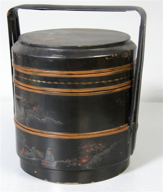 Appraisal: Chinese black lacquered four tier food carrier with figure and