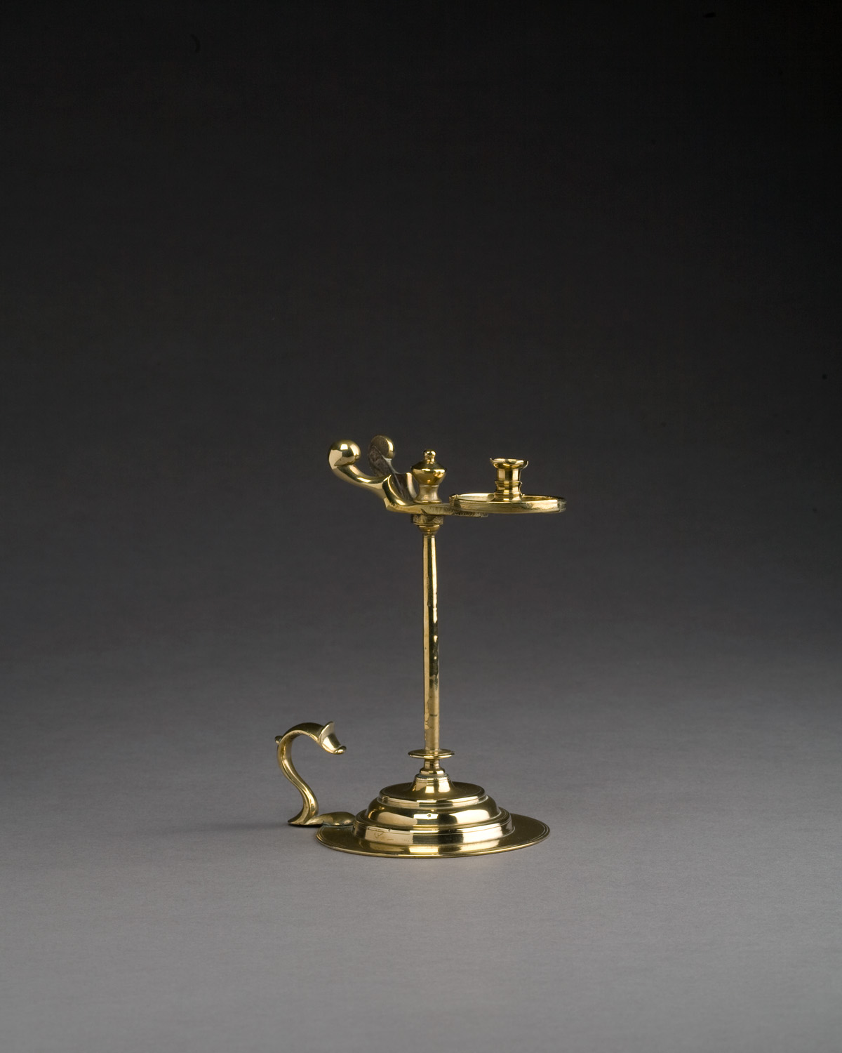 Appraisal: GEORGE III BRASS TAPER JACK CIRCA - The spring-operated jaws