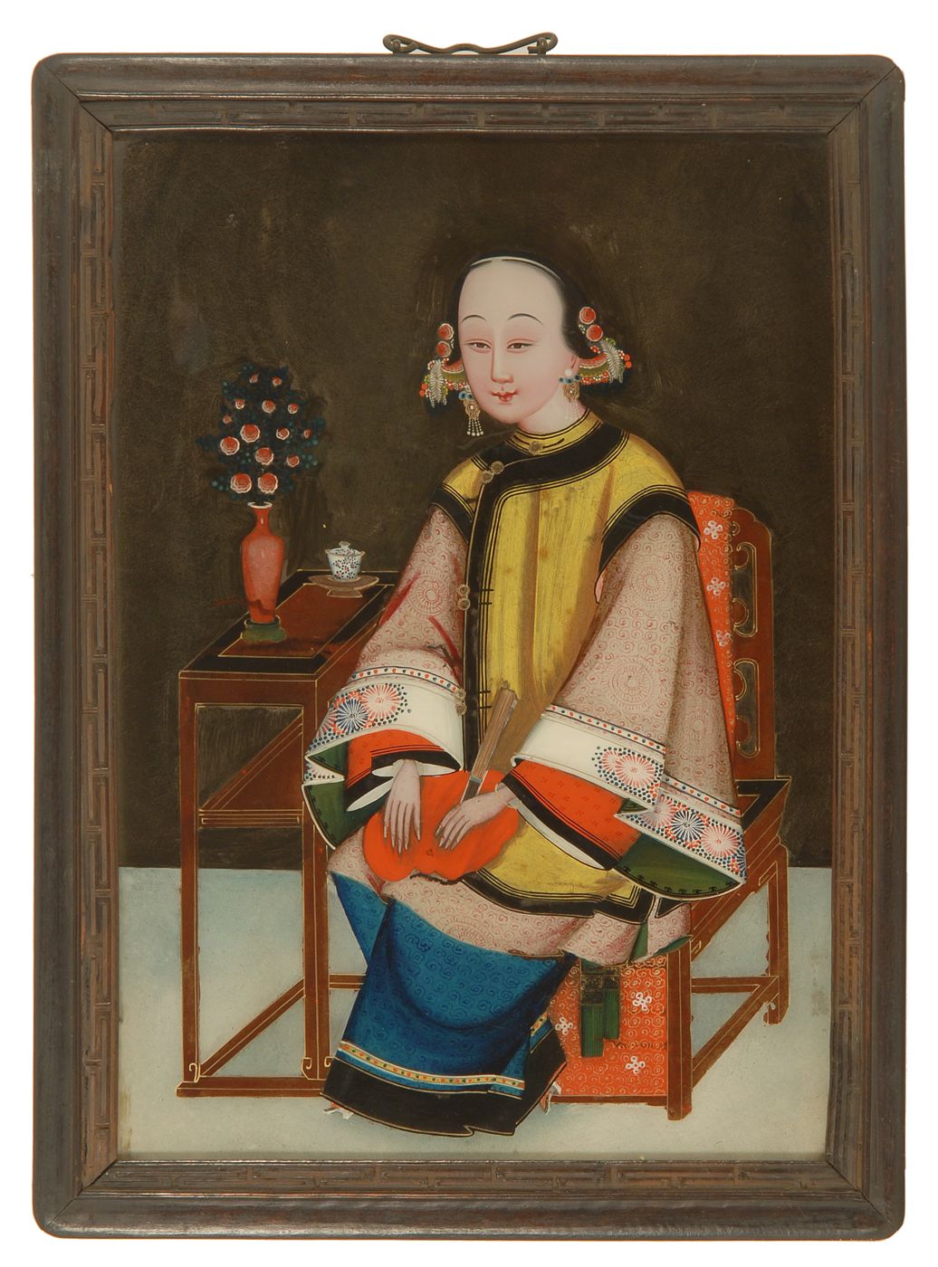 Appraisal: FRAMED REVERSE-PAINTING-ON-GLASS Chinese th CenturyDepicting a woman seated at a