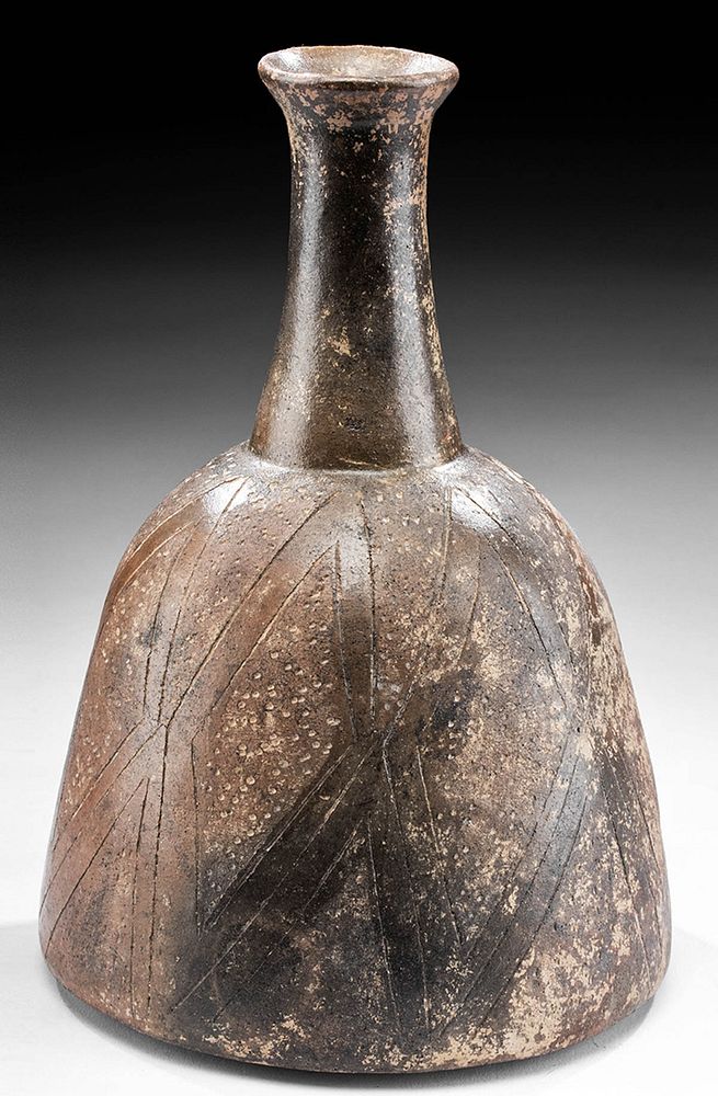 Appraisal: Chavin Pottery Bottle w Incised Motifs Originally Listed At Pre-Columbian