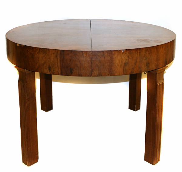 Appraisal: An Art Deco burled walnut veneered dining table with one