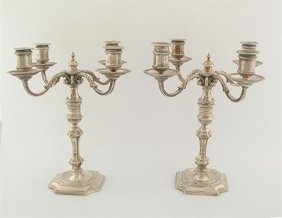 Appraisal: A pair of four-light candelabra with scroll branches and rope