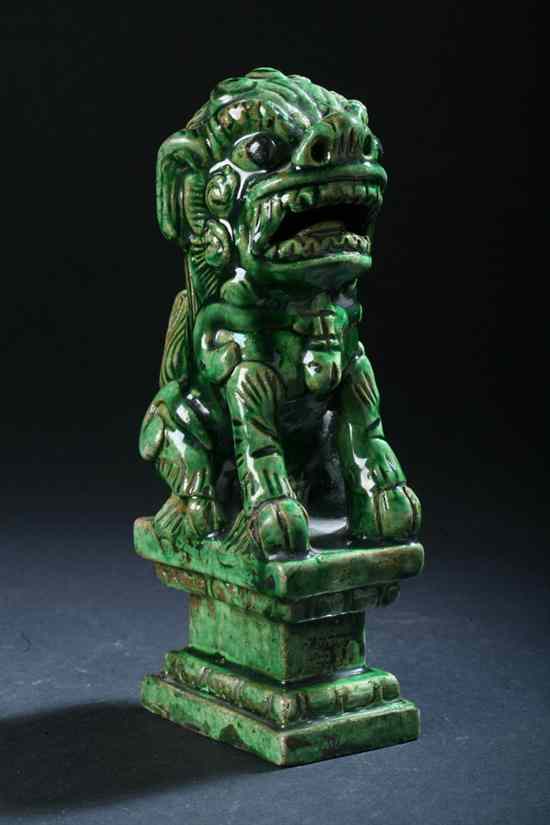 Appraisal: CHINESE MONOCHROME GREEN PORCELAIN FU LION th century - in