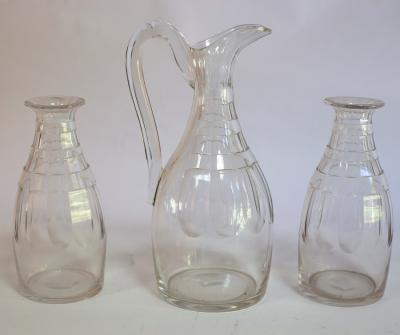 Appraisal: A cut glass ewer and two carafes Note Reputedly once