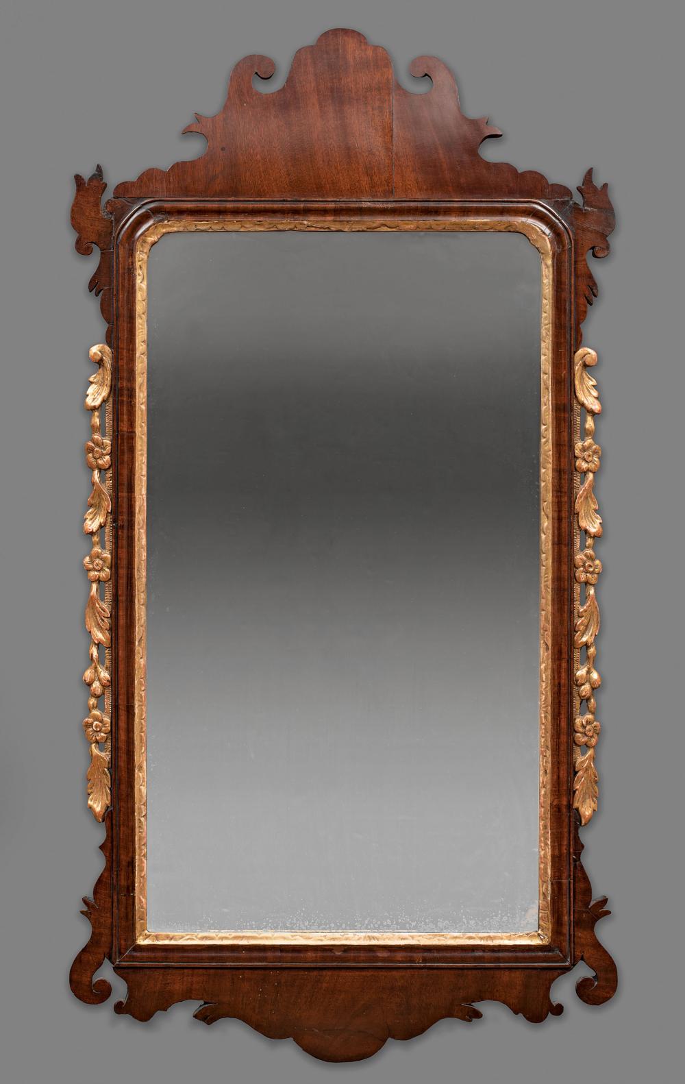 Appraisal: Chippendale Mahogany and Parcel-Gilt Mirror th c and later shaped