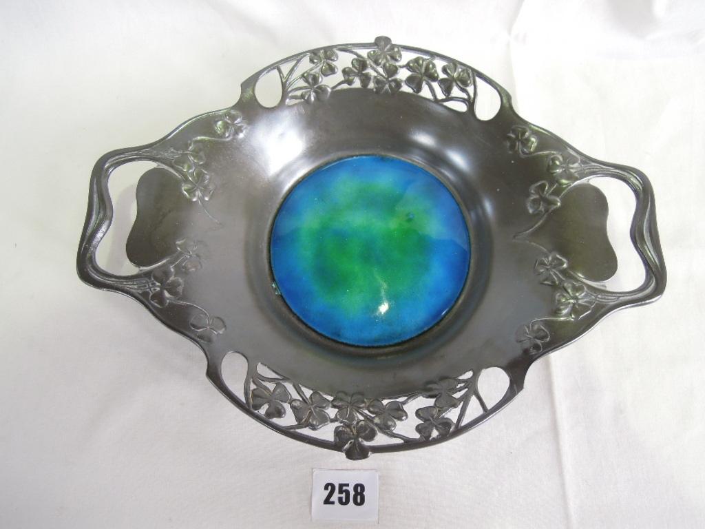 Appraisal: A Tudric pewter two handled dish with embossed and pierced