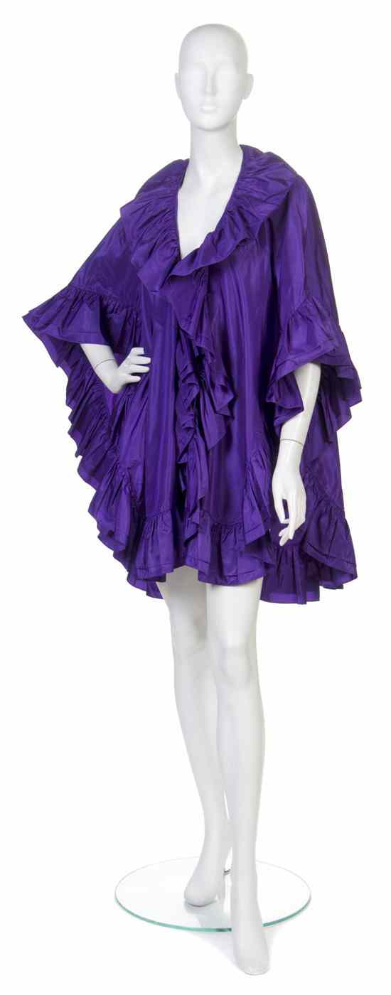 Appraisal: A Christian Dior Purple Taffeta Evening Shawl with ruffle trim