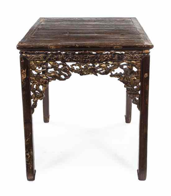 Appraisal: A Chinese Carved Wood and Parcel Gilt Occasional Table having