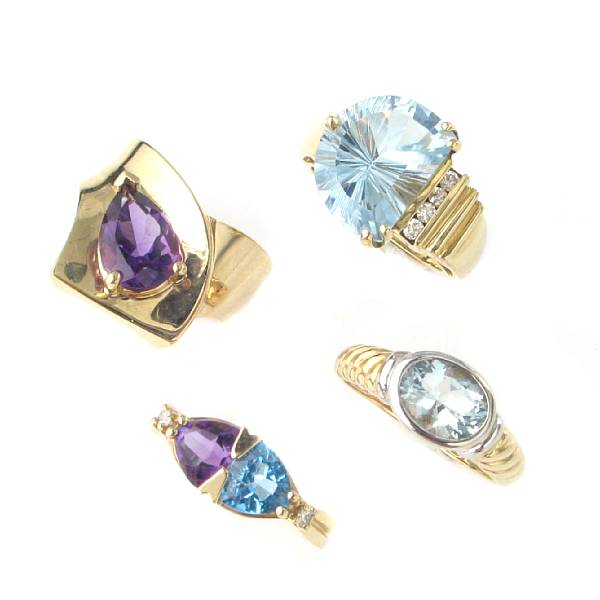 Appraisal: A collection of amethyst blue topaz diamond and gold rings