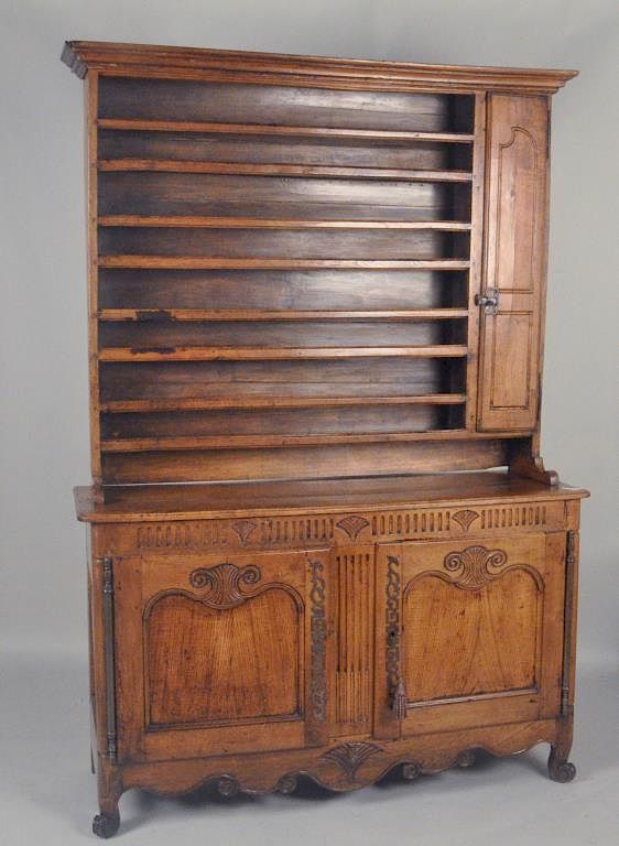 Appraisal: French Two Part Carved Chestnut Vaisselier having four open shelves