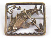 Appraisal: Georg Jensen A silver brooch designed as two leaping dolphins