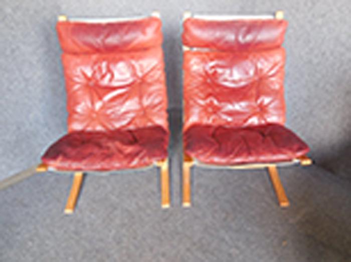 Appraisal: PAIR OF INGMAR RELLING NORWEGIAN - RED LEATHER ARMCHAIRS