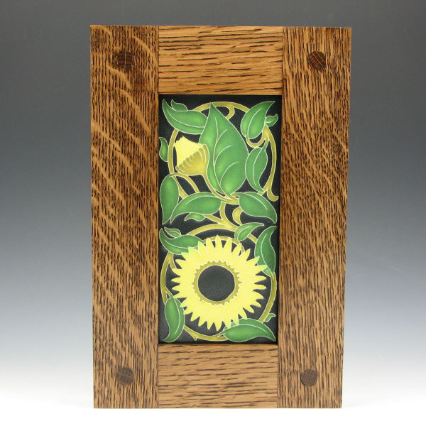 Appraisal: Arts Crafts sunflower motif Motawi tile in a custom oak