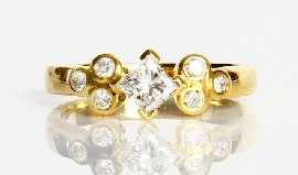 Appraisal: An ct gold princess and round brilliant cut diamond ring