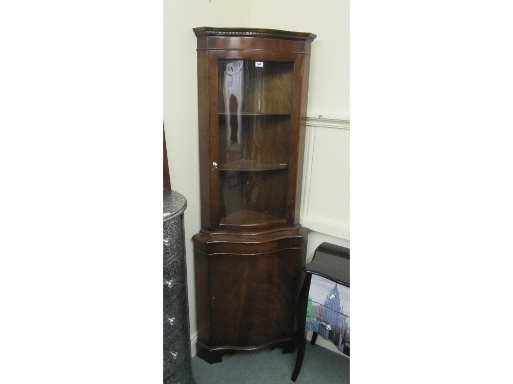 Appraisal: Reproduction glazed mahogany corner cabinet