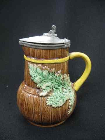 Appraisal: Majolica Pottery Syrup Pitcher fern fence decor '' hinged pewter