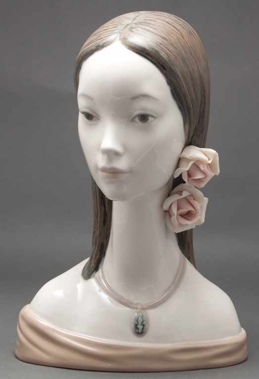 Appraisal: Lladro porcelain bust of a young woman with roses in