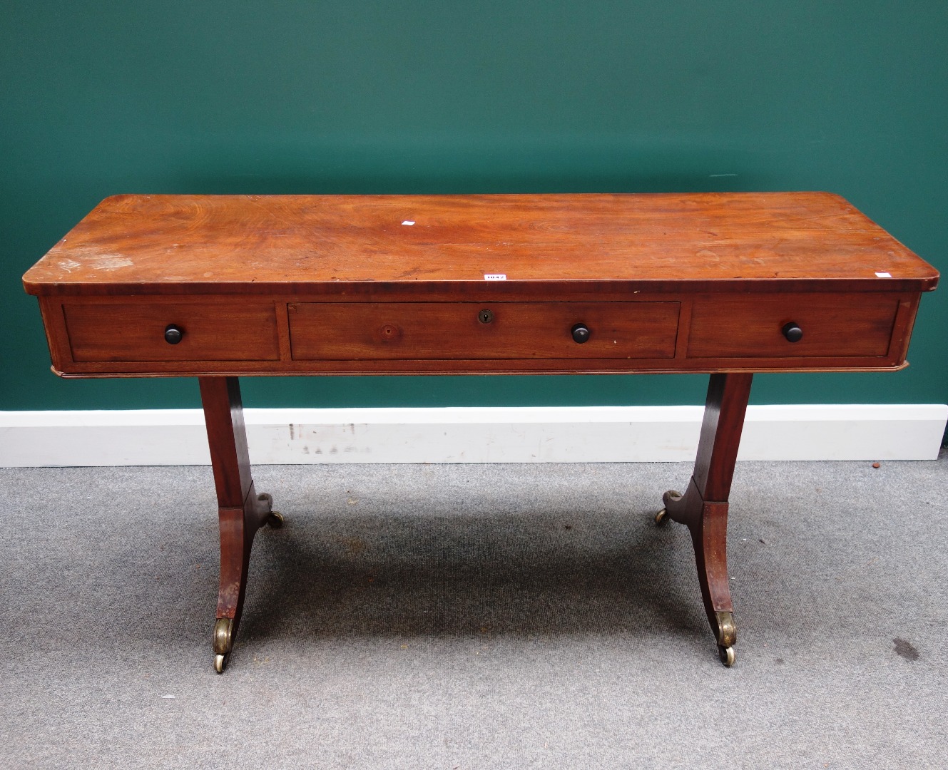 Appraisal: A th century mahogany reading table the rounded rectangular top