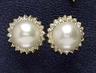 Appraisal: PEARL AND DIAMOND EARRINGS k yellow gold stud earrings with