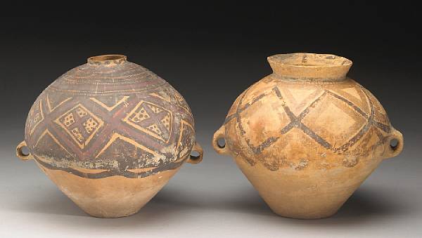 Appraisal: Two painted pottery storage jars Neolithic Period The first of