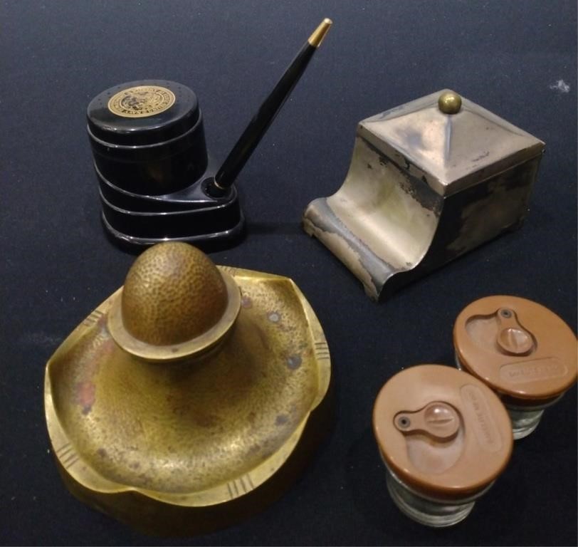 Appraisal: A group of ink wells including a lidded silvered with