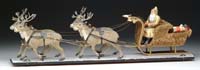 Appraisal: EXCEPTIONAL WHEELED PLATFORM PAPIER MACHE SANTA IN SLEIGH WITH REINDEER