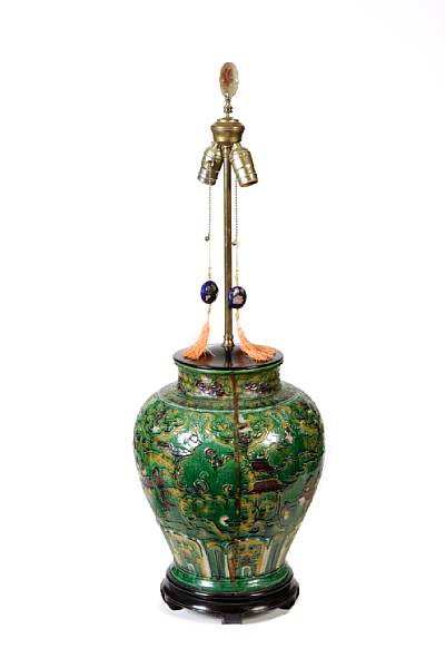 Appraisal: A Chinese glazed earthenware jar now mounted as a lamp