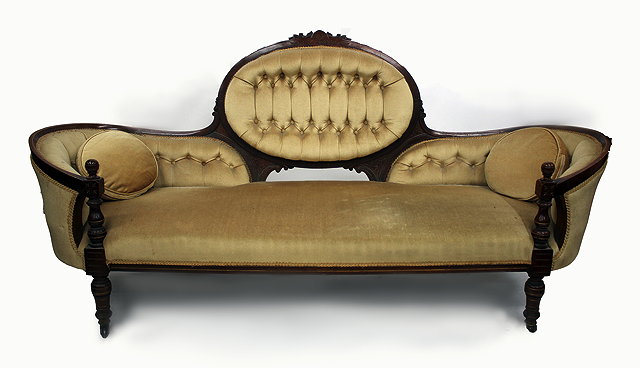 Appraisal: A LARGE LATE TH CENTURY WALNUT FRAMED SETTEE with button