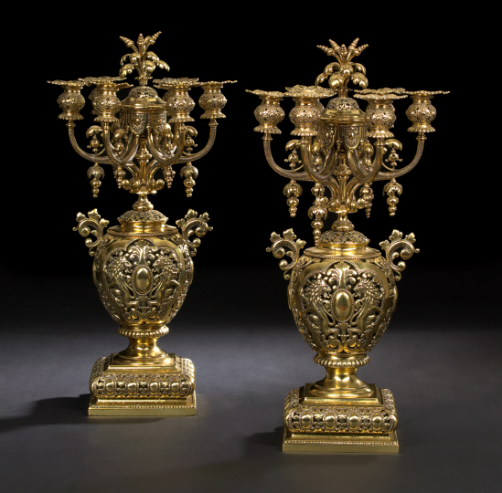 Appraisal: Large Pair of Continental Reticulated Brass Six-Light Candelabra first quarter