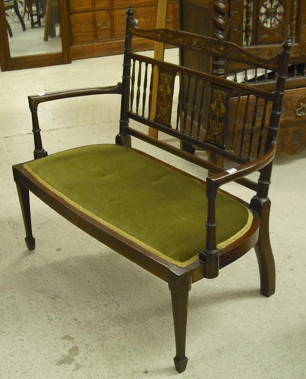 Appraisal: Good small Edwardian mahogany two seater settee the turned spindled