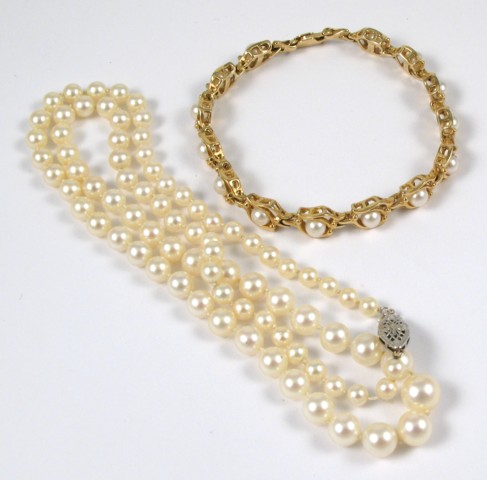 Appraisal: TWO ARTICLES OF PEARL JEWELRY including a pearl and k