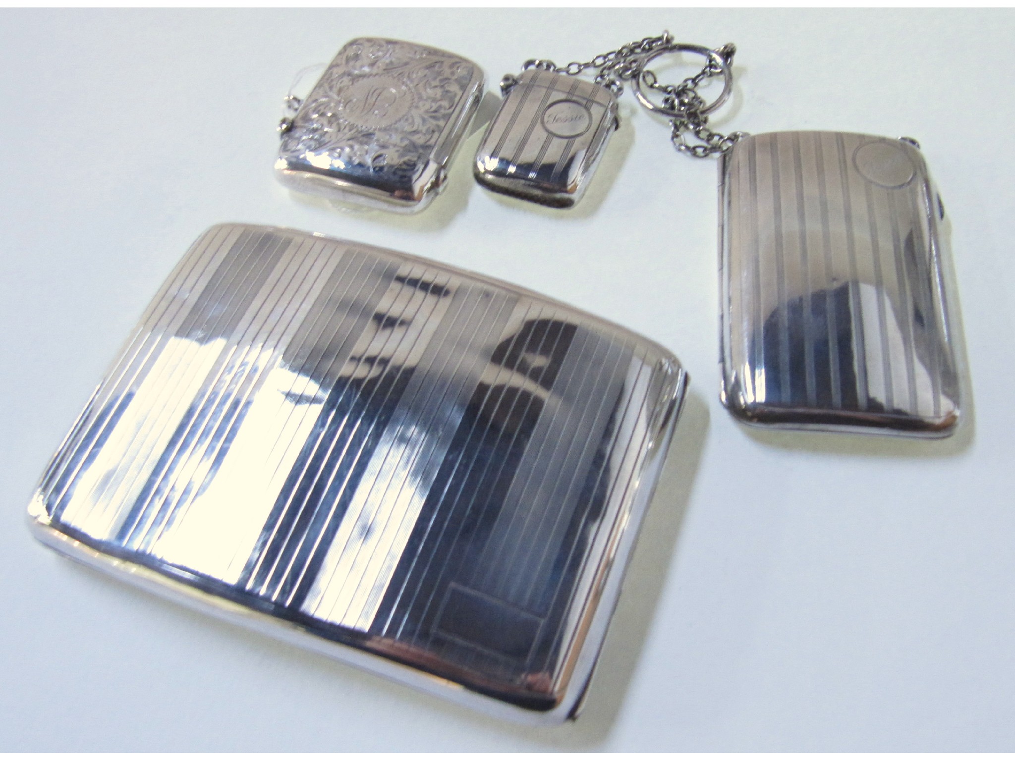 Appraisal: A lot comprising a silver cigarette case a ladies silver