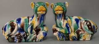 Appraisal: Pair of glazed recumbent dog figures ht in lg in