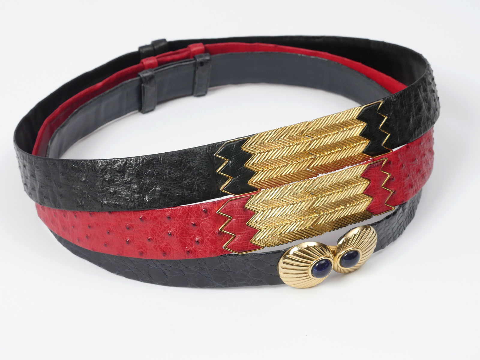 Appraisal: JUDITH LIEBER BELTS Red ostrich skin belt with gold belt