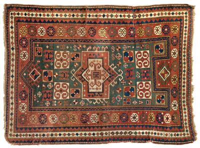 Appraisal: Caucasian prayer rug central medallion and geometric elements on olive