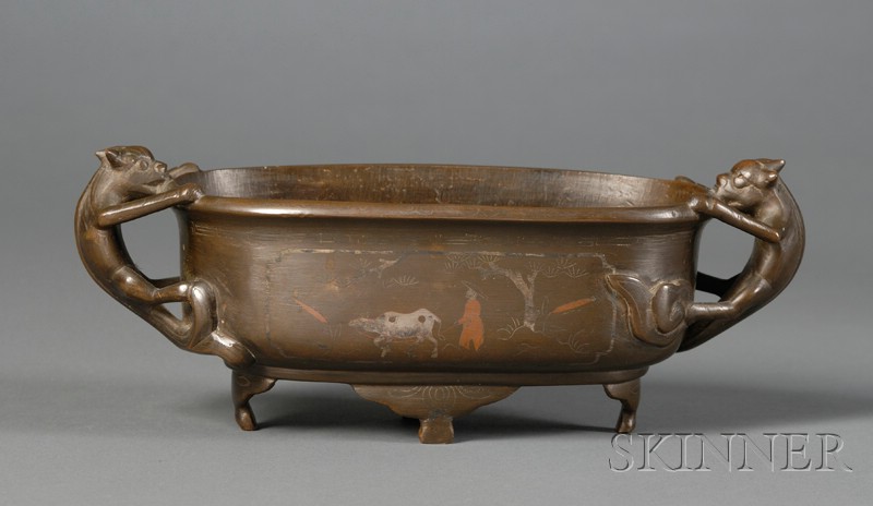 Appraisal: Oval Bronze Censer China th century dragon handles surface inlaid