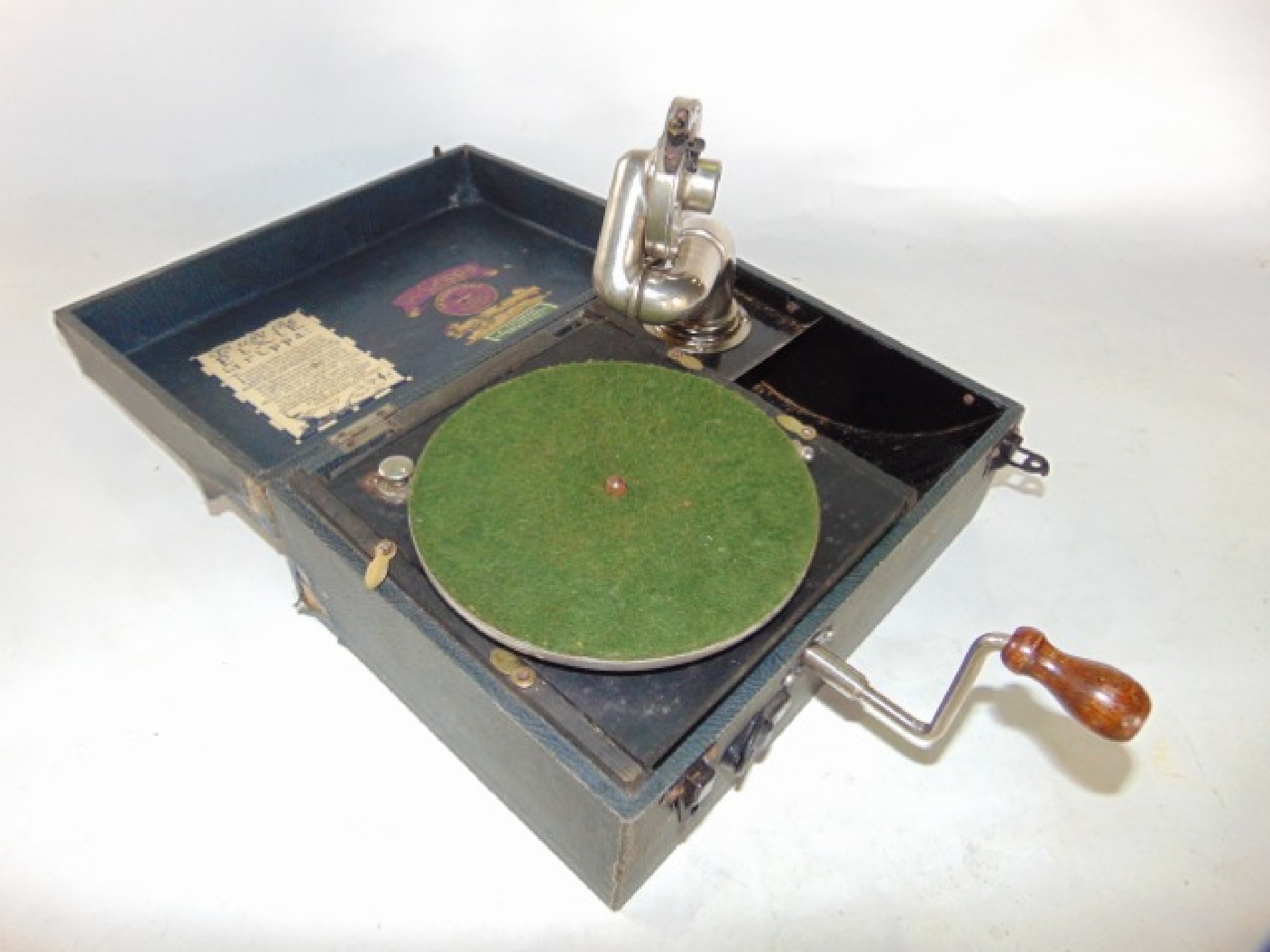 Appraisal: A miniature cased table top Perophone The Grippa Portable Pixie