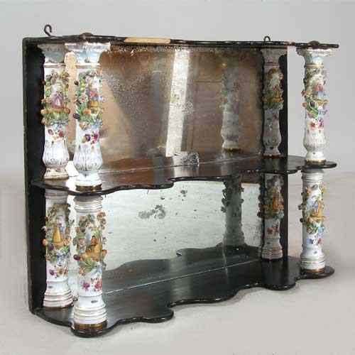 Appraisal: A German Dresden Porcelain Mirrored Two-Tier Wall Shelf circa the