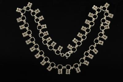 Appraisal: A Finnish silver necklace the square links each with quatrefoil