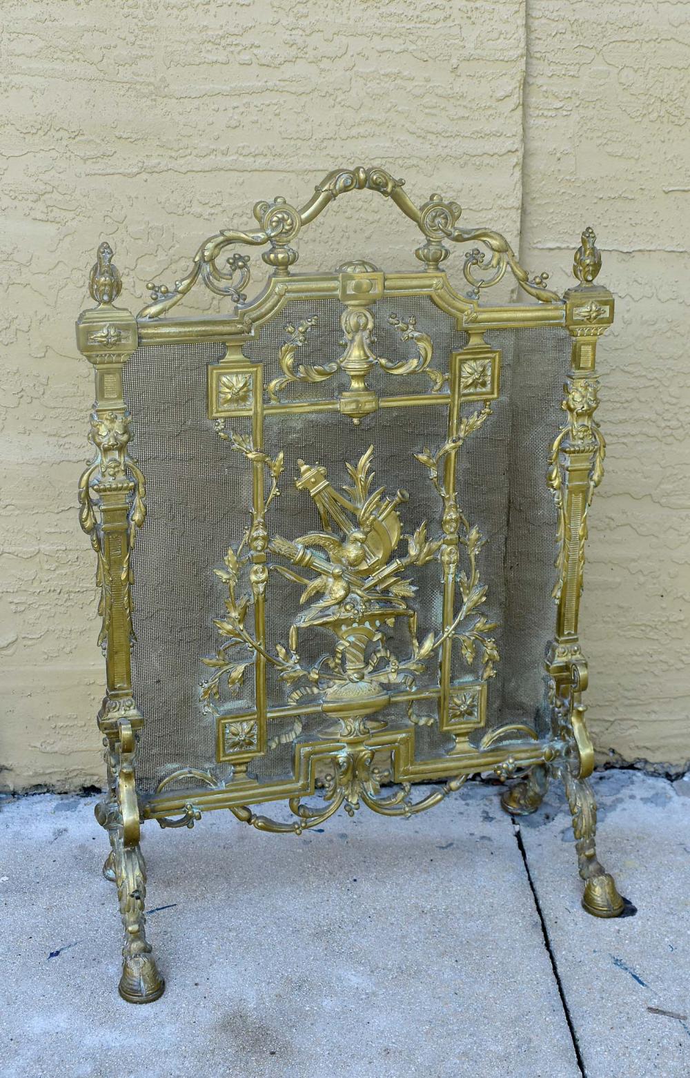 Appraisal: FRENCH BRONZE AND WIRE MESH FIRE SCREENRectangular centered by a