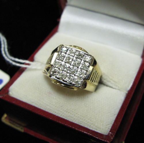 Appraisal: MAN'S DIAMOND AND FOURTEEN KARAT GOLD RING the yellow gold