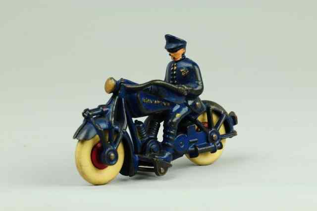 Appraisal: CHAMPION POLICEMAN ON CYCLE Champion cast iron painted in blue