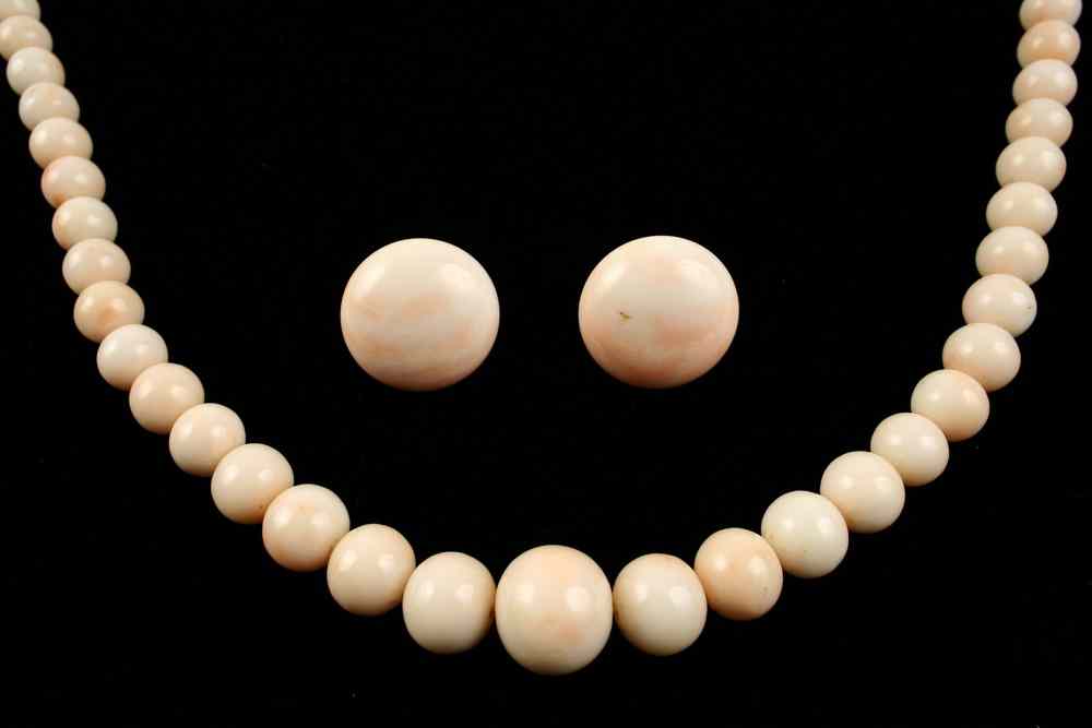 Appraisal: NECKLACE SET - A natural pink coral graduated bead necklace