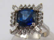 Appraisal: A white metal tests carat gold tanzanite and diamond ring