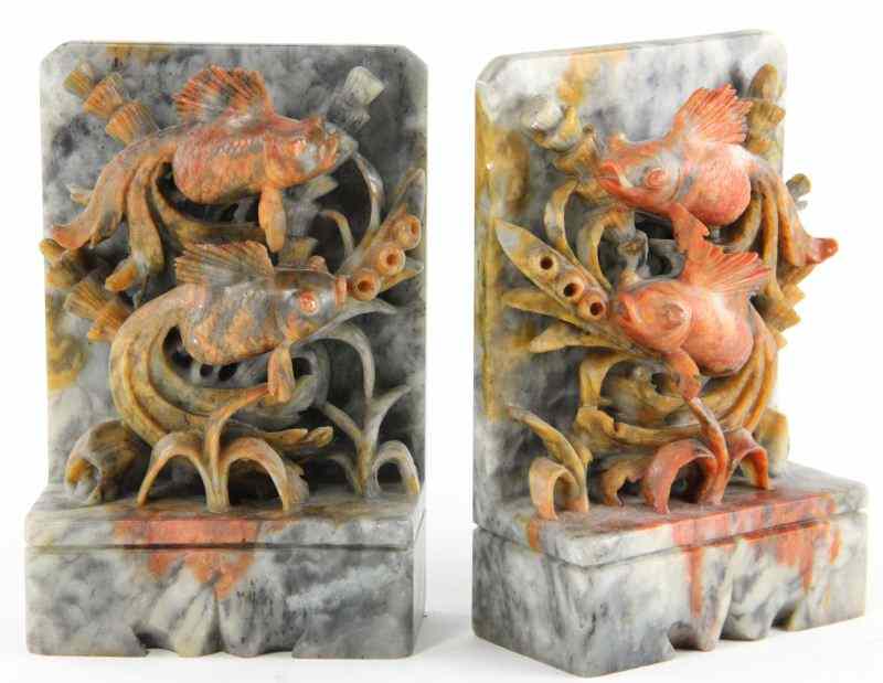 Appraisal: Pair of Carved Chinese Hardstone Bookendseach featuring fancy goldfish swimming